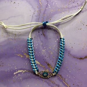 Handmade nylon satin adjustable bracelet with evil eye charm